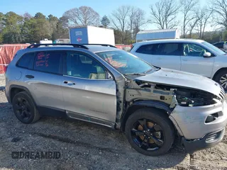 2017 Jeep Cherokee Sport with VIN 1C4PJLAB4HW603099, listed as a IAAI auction lot 41663602 with 150,662 mi miles. Bid and sale history available at carsss.com. Image 14.