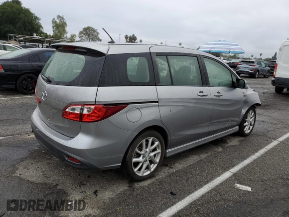 2012 Mazda 5 Touring with VIN JM1CW2CL8C0121599, listed as a Copart auction lot 50520895 with 131,948 mi miles and Salvage title. Bid and sale history available at DreamBid. Image 3.