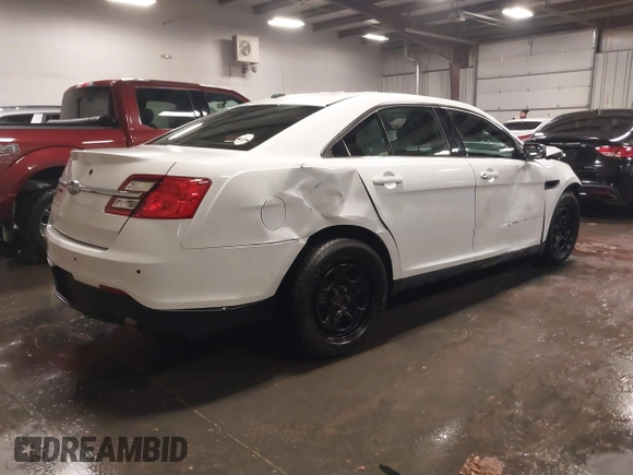 2016 Ford Police Interceptor with VIN 1FAHP2MK6GG106563, listed as a IAAI auction lot 41208421 with 71,719 mi miles and . Bid and sale history available at DreamBid. Image 4.
