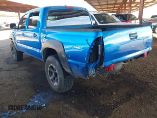 2009 Toyota Tacoma PreRunner with VIN 3TMJU62N69M072481, listed as a IAAI auction lot 41425389 with 212,723 mi miles. Bid and sale history available at carsss.com. Image 3.