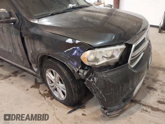 2013 Dodge Durango Crew z VIN 1C4RDJDG7DC661411, wystawiony jako IAAI lot #41617514 z przebiegiem 145 309 mil mil oraz . Historia ofert i sprzedaży dostępna na DreamBid. Obrazek 6.