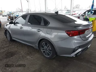 2023 Kia Forte GT-Line z VIN 3KPF54AD6PE681500, wystawiony jako IAAI lot #41772612 z przebiegiem 23 041 mil mil oraz . Historia ofert i sprzedaży dostępna na DreamBid. Obrazek 3.