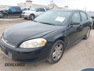 2013 Chevrolet Impala LT with VIN 2G1WB5E30D1202571, listed as a IAAI auction lot 41946958 with 104,291 mi miles and . Bid and sale history available at DreamBid. Image 2.