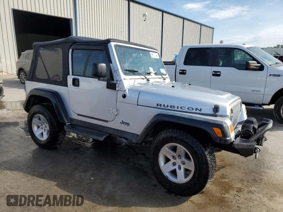 2005 Jeep Wrangler Rubicon with VIN 1J4FA69S75P383071, listed as a Copart auction lot 86371504 with 92,951 mi miles and Salvage Title. Bid and sale history available at carsss.com. Image 4.