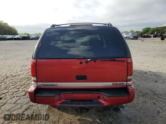 2001 GMC Jimmy SLE with VIN 1GKDT13W912214882, listed as a Copart auction lot 51258815 with 261,664 mi miles and Salvage Title. Bid and sale history available at carsss.com. Image 6.