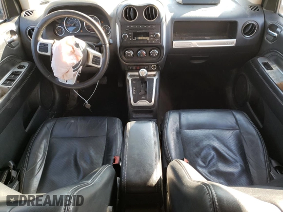 2016 Jeep Compass Latitude with VIN 1C4NJDEB2GD697923, listed as a Copart auction lot 84081394 with 167,240 mi miles and Salvage Title. Bid and sale history available at carsss.com. Image 8.