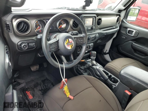 2019 Jeep Wrangler Sport S with VIN 1C4GJXAG0KW608696, listed as a Copart auction lot 57963455 with 51,955 mi miles and Salvage title. Bid and sale history available at DreamBid. Image 8.