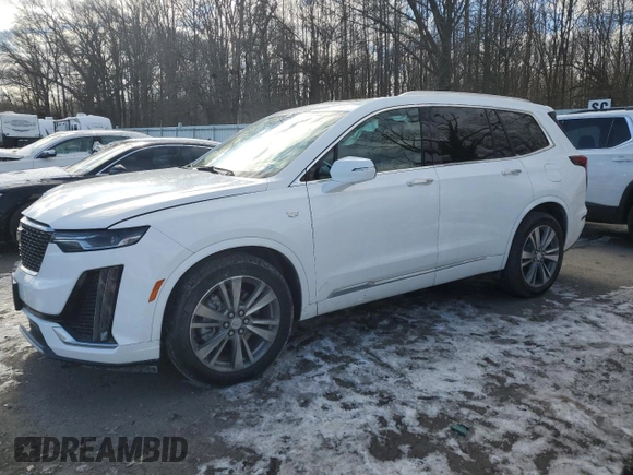 2022 Cadillac XT6 Premium Luxury with VIN 1GYKPCRS4NZ128684, listed as a Copart auction lot 87806525 with 23,571 mi miles and Salvage Title. Bid and sale history available at carsss.com. Image 1.