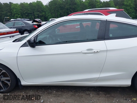 2018 Honda Civic Si z VIN 2HGFC3A52JH751998, wystawiony jako IAAI lot #42415499 z przebiegiem 58 088 mil mil oraz . Historia ofert i sprzedaży dostępna na DreamBid. Obrazek 14.
