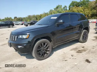 2018 Jeep Grand Cherokee Laredo E with VIN 1C4RJFAG9JC390597, listed as a Copart auction lot 71450474 with 69,645 mi miles and Salvage title. Bid and sale history available at DreamBid. Image 1.
