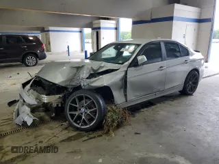 2014 BMW 3 Series 320i with VIN WBA3B1G51ENS79965, listed as a Copart auction lot 57120795 with 125,200 mi miles and Salvage title. Bid and sale history available at DreamBid. Image 1.