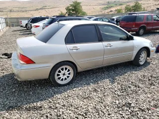 2003 Mitsubishi Lancer ES with VIN JA3AJ26E93U087831, listed as a Copart auction lot 65413304 with 167,241 mi miles and Salvage Title. Bid and sale history available at carsss.com. Image 3.