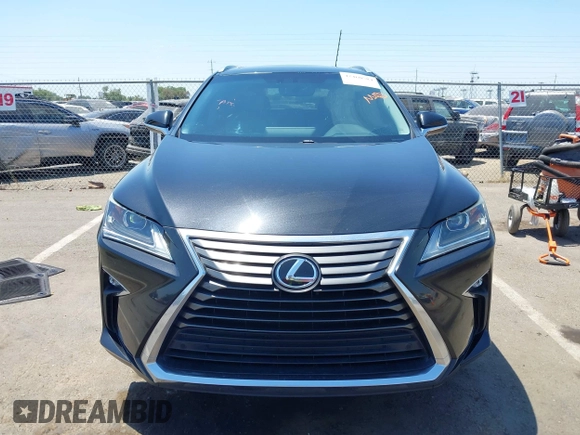 2016 Lexus RX 350 z VIN 2T2ZZMCA2GC031660, wystawiony jako IAAI lot #42460584 z przebiegiem 90 978 mil mil oraz . Historia ofert i sprzedaży dostępna na DreamBid. Obrazek 12.