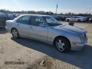 2000 Mercedes-Benz E-Class AWD with VIN WDBJF83J6YX032328, listed as a Copart auction lot 81353974 with 156,729 mi miles and Clean Title. Bid and sale history available at carsss.com. Image 4.