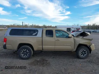 2016 Toyota Tacoma SR with VIN 5TFRX5GN8GX057937, listed as a IAAI auction lot 40760420 with 113,698 mi miles and . Bid and sale history available at DreamBid. Image 13.