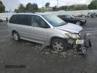 2004 Mazda MPV LX with VIN JM3LW28A840523283, listed as a Copart auction lot 51441785 with 215,235 mi miles and Salvage title. Bid and sale history available at DreamBid. Image 4.