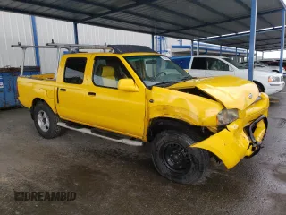 2001 Nissan Frontier SE z VIN 1N6ED27T91C326124, wystawiony jako Copart lot #50929905 z przebiegiem 212 615 mil mil oraz Szkoda całkowita • Salvage title. Historia ofert i sprzedaży dostępna na DreamBid. Obrazek 4.
