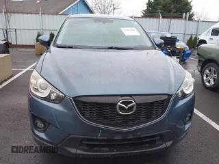 2015 Mazda CX-5 Grand Touring with VIN JM3KE4DY0F0493969, listed as a IAAI auction lot 41581885 with 71,014 mi miles. Bid and sale history available at carsss.com. Image 13.
