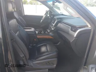 2018 Chevrolet Suburban Premier with VIN 1GNSCJKC5JR135265, listed as a IAAI auction lot 42028935 with 136,382 mi miles and . Bid and sale history available at DreamBid. Image 5.