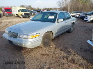 1996 Mercury Grand Marquis GS with VIN 2MELM74W8TX692876, listed as a IAAI auction lot 41404447 with Not Provided miles and . Bid and sale history available at DreamBid. Image 2.