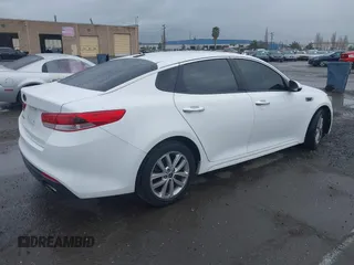 2016 Kia Optima LX with VIN 5XXGT4L30GG049534, listed as a IAAI auction lot 41770579 with 94,257 mi miles. Bid and sale history available at carsss.com. Image 4.