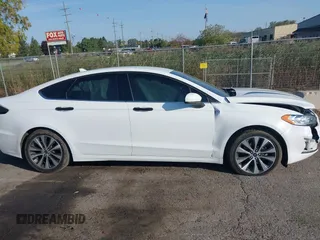 2020 Ford Fusion SE z VIN 3FA6P0T93LR247572, wystawiony jako IAAI lot #40481880 z przebiegiem 59 141 mil mil oraz . Historia ofert i sprzedaży dostępna na DreamBid. Obrazek 13.