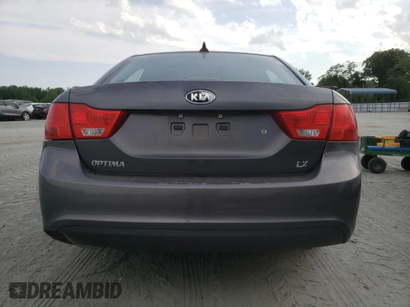 2009 Kia Optima LX z VIN KNAGE228695331919, wystawiony jako Copart lot #57804835 z przebiegiem 199 204 mil mil oraz Szkoda całkowita • Salvage title. Historia ofert i sprzedaży dostępna na DreamBid. Obrazek 6.
