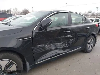 2012 Kia Optima Hybrid with VIN KNAGM4AD2C5028169, listed as a IAAI auction lot 41684839 with 154,150 mi miles. Bid and sale history available at carsss.com. Image 6.
