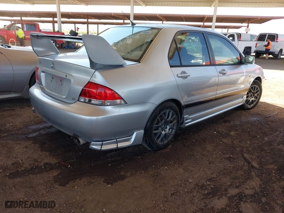 2005 Mitsubishi Lancer ES with VIN JA3AJ26E55U009131, listed as a IAAI auction lot 41980014 with 227,805 mi miles. Bid and sale history available at carsss.com. Image 4.