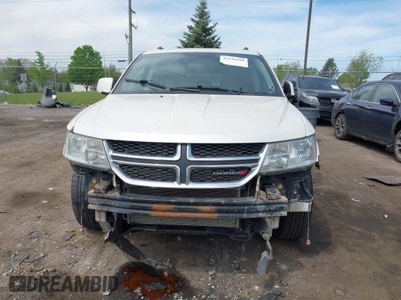 2012 Dodge Journey SXT with VIN 3C4PDCBG4CT372642, listed as a IAAI auction lot 42238499 with 172,033 mi miles and . Bid and sale history available at DreamBid. Image 13.