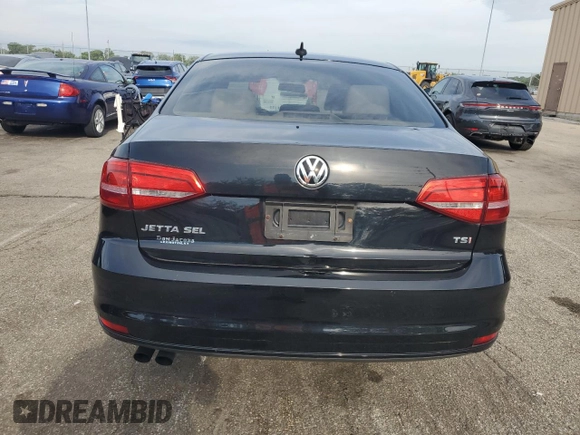 2015 Volkswagen Jetta SEL z VIN 3VWL17AJ2FM281957, wystawiony jako Copart lot #65836185 z przebiegiem 82 478 mil mil oraz Czysty tytuł • Clean title. Historia ofert i sprzedaży dostępna na DreamBid. Obrazek 6.
