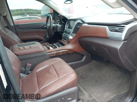 2016 Chevrolet Tahoe LTZ with VIN 1GNSKCKC7GR171904, listed as a IAAI auction lot 41967060 with 223,334 mi miles and . Bid and sale history available at DreamBid. Image 5.