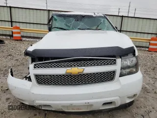 2013 Chevrolet Suburban LT with VIN 1GNSCJE09DR255852, listed as a Copart auction lot 70043984 with Not Provided miles and Salvage Title. Bid and sale history available at carsss.com. Image 5.
