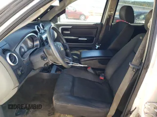 2007 Mitsubishi Raider LS z VIN 1Z7HT28K57S234309, wystawiony jako Copart lot #75505104 z przebiegiem 210 964 mil mil oraz Szkoda całkowita • Salvage title. Historia ofert i sprzedaży dostępna na DreamBid. Obrazek 7.