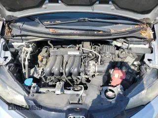 2016 Honda Fit LX z VIN JHMGK5H50GX035949, wystawiony jako Copart lot #52251375 z przebiegiem 112 768 mil mil oraz Szkoda całkowita • Salvage title. Historia ofert i sprzedaży dostępna na DreamBid. Obrazek 11.