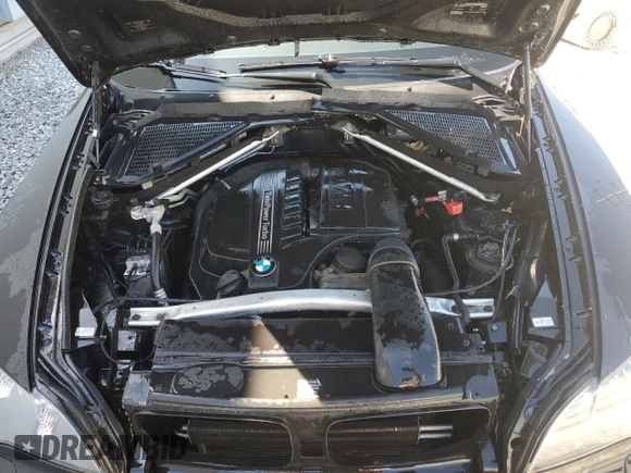 2012 BMW X5 35i with VIN 5UXZV4C58CL753610, listed as a Copart auction lot 53920475 with 145,483 mi miles and Clean title. Bid and sale history available at DreamBid. Image 12.