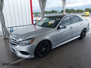 2014 Mercedes-Benz E-Class E 350 Luxury with VIN WDDHF8JB1EA816030, listed as a IAAI auction lot 41984219 with 117,790 mi miles. Bid and sale history available at carsss.com. Image 2.