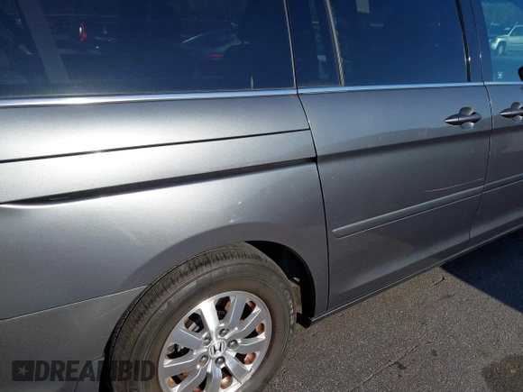 2010 Honda Odyssey EX-L with VIN 5FNRL3H76AB010388, listed as a IAAI auction lot 41678322 with 197,826 mi miles and . Bid and sale history available at carsss.com. Image 13.