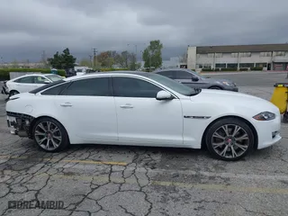 2016 Jaguar XJ with VIN SAJWA2GE3GMV93216, listed as a IAAI auction lot 41890225 with 70,007 mi miles. Bid and sale history available at carsss.com. Image 14.