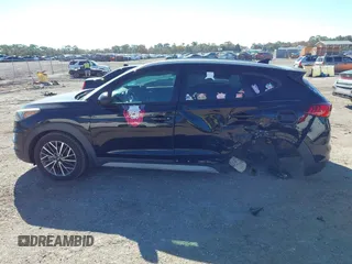 2019 Hyundai Tucson Sport with VIN KM8J33AL5KU902933, listed as a IAAI auction lot 41286316 with 73,799 mi miles. Bid and sale history available at carsss.com. Image 15.