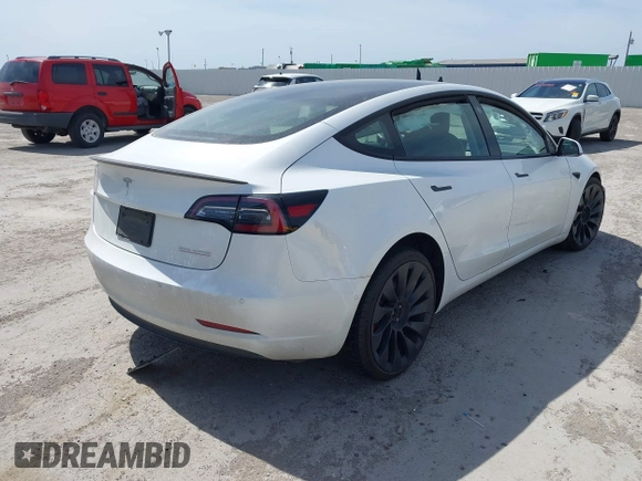 2021 Tesla Model 3 Performance with VIN 5YJ3E1EC8MF044388, listed as a IAAI auction lot 41821892 with Not Provided miles and . Bid and sale history available at carsss.com. Image 4.