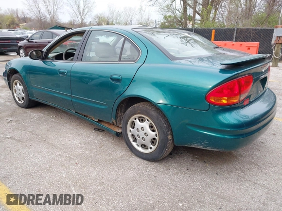 1999 Oldsmobile Alero GL z VIN 1G3NL52T7XC398799, wystawiony jako IAAI lot #41911602 z przebiegiem 252 504 mil mil oraz . Historia ofert i sprzedaży dostępna na DreamBid. Obrazek 3.