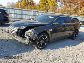 2015 Ford Taurus SEL z VIN 1FAHP2E85FG151155, wystawiony jako Copart lot #77791634 z przebiegiem 224 144 mil mil oraz Szkody całkowita. Historia ofert i sprzedaży dostępna na DreamBid. Obrazek 1.