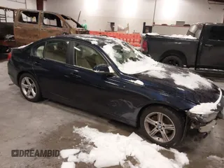 2013 BMW 3 Series 328i xDrive with VIN WBA3B5G51DNS02230, listed as a IAAI auction lot 41237054 with 89,704 mi miles. Bid and sale history available at carsss.com. Image 1.
