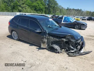 2014 BMW X1 sDrive28i z VIN WBAVM1C52EVW51919, wystawiony jako Copart lot #52282325 z przebiegiem Nie podano mil oraz Szkody całkowita. Historia ofert i sprzedaży dostępna na DreamBid. Obrazek 4.