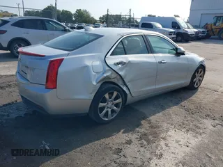 2015 Cadillac ATS Luxury RWD z VIN 1G6AB5RA6F0127029, wystawiony jako IAAI lot #42376359 z przebiegiem 131 823 mil mil oraz . Historia ofert i sprzedaży dostępna na DreamBid. Obrazek 6.