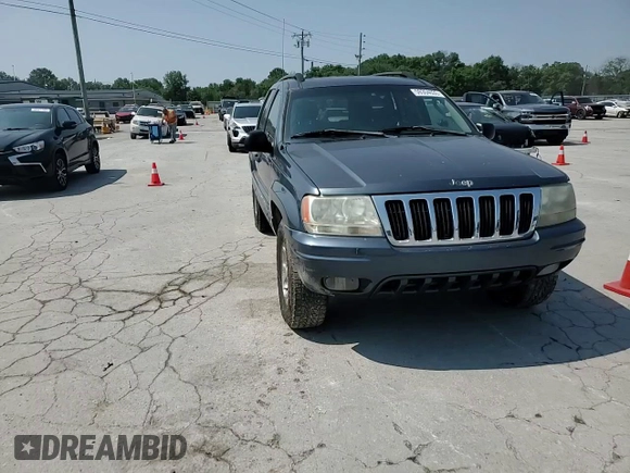 2002 Jeep Grand Cherokee Laredo with VIN 1J4GW48S92C319161, listed as a Copart auction lot 59304035 with 257,907 mi miles and Salvage title. Bid and sale history available at DreamBid. Image 14.