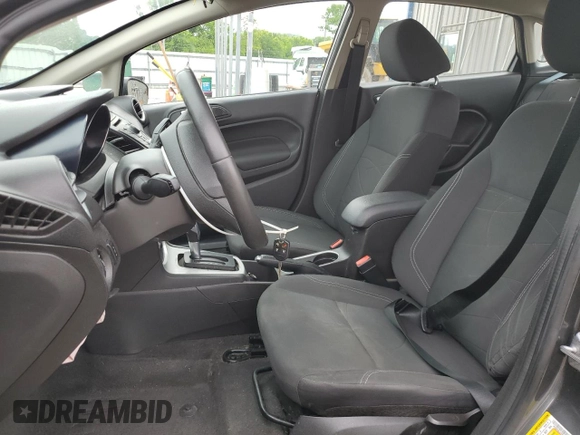 2015 Ford Fiesta SE z VIN 3FADP4BJ2FM114569, wystawiony jako Copart lot #56785265 z przebiegiem 71 045 mil mil oraz Szkoda całkowita • Salvage title. Historia ofert i sprzedaży dostępna na DreamBid. Obrazek 7.