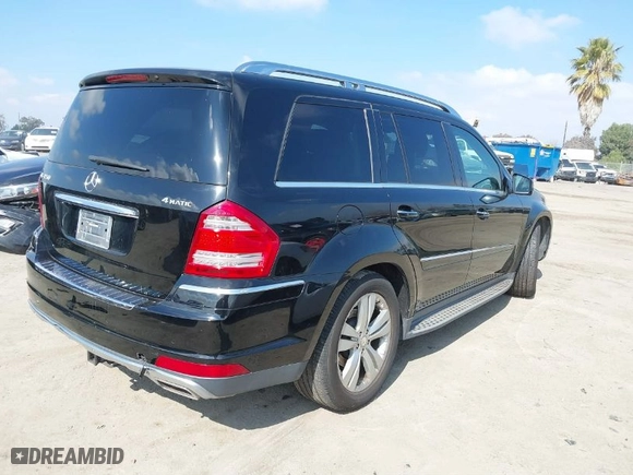 2012 Mercedes-Benz GL-Class GL 450 with VIN 4JGBF7BE8CA772992, listed as a IAAI auction lot 41532020 with 123,904 mi miles. Bid and sale history available at carsss.com. Image 4.