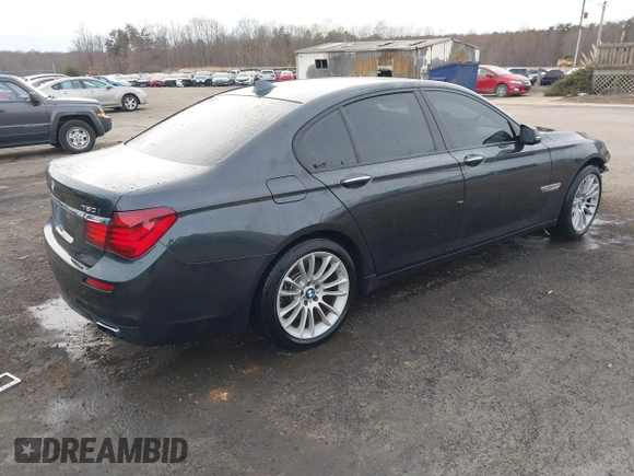 2015 BMW 7 Series 750i xDrive with VIN WBAYB6C56FG299238, listed as a IAAI auction lot 41441393 with 62,396 mi miles. Bid and sale history available at carsss.com. Image 4.